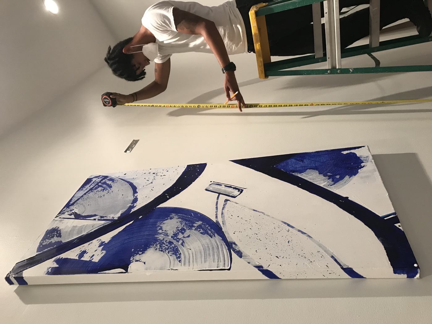 Canvas on studio floor — detail